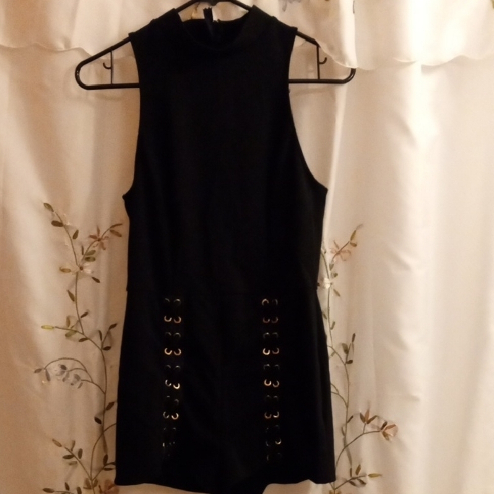 Charlotte Russe Black Sleeveless Romper with Grommet Detail - Picture 1 of 6